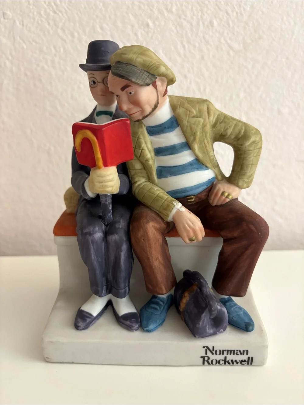 Norman Rockwell Two Men Reading Figurine — Red, Blue, Brown, Cream